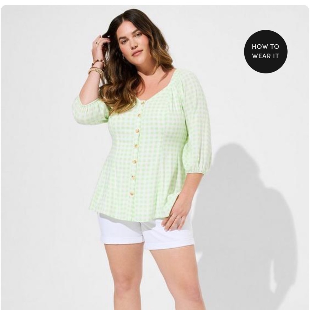 Torrid fit&flare peplum style button up top . NWT size 4